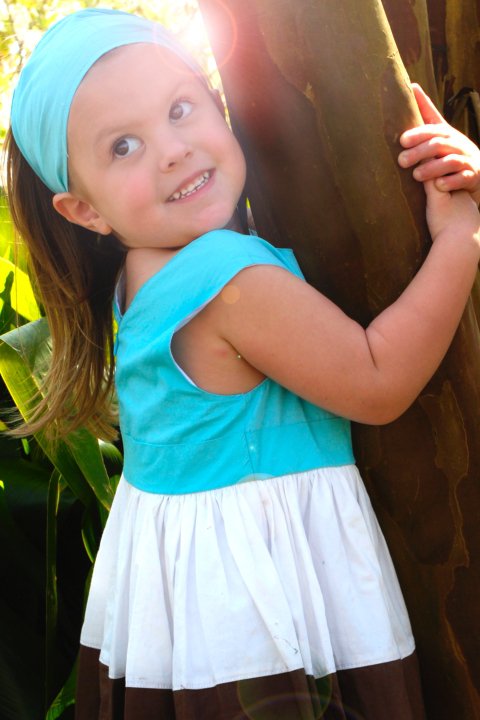 girl against tree